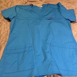 Women’s used scrub top med
